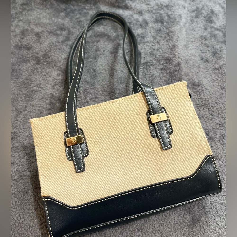Etienne Aigner Small Straw bag with Navy Blue trim.